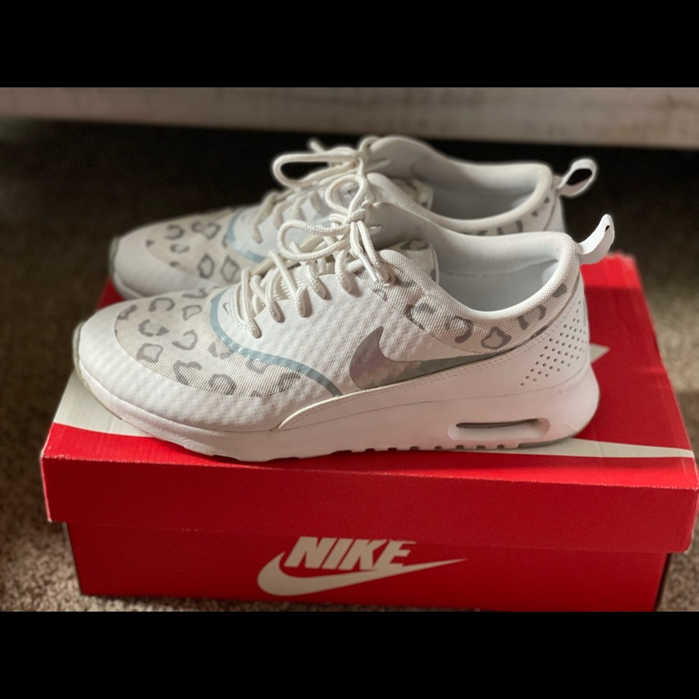 White/silver cheetah Nike tennis shoes
